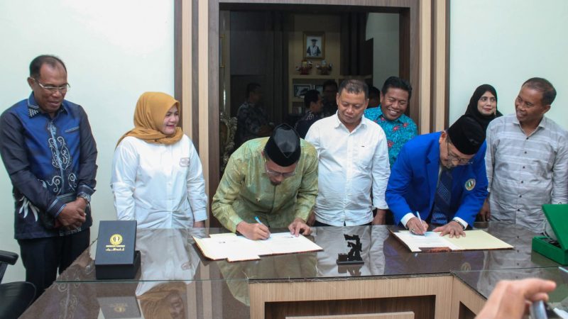 Universitas Alkhairaat Teken MoU dengan Pemkab Touna; Bupati Ilham Siap Jadi Mahasiswa Pascasarjana